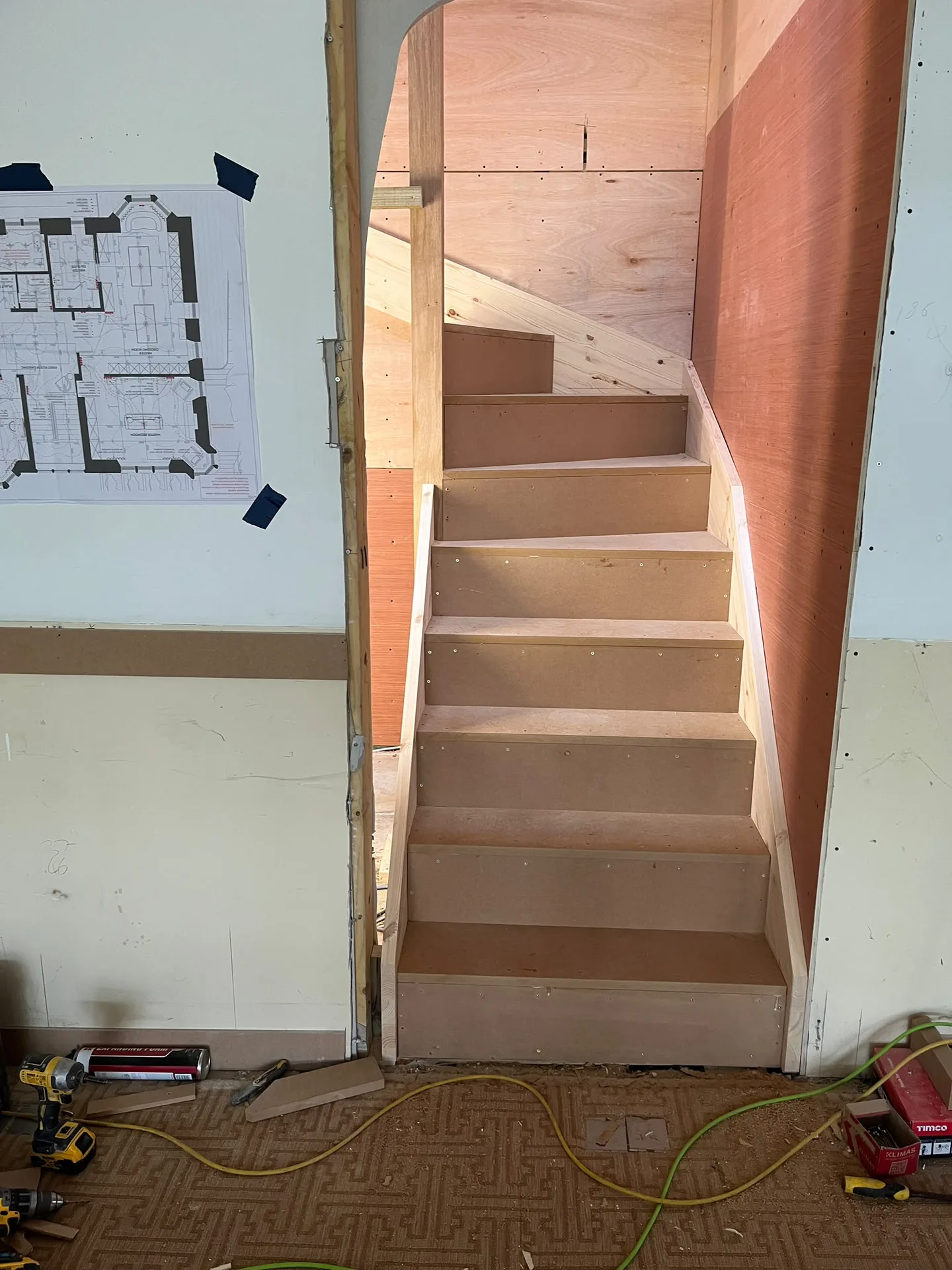 Wooden staircase construction in progress