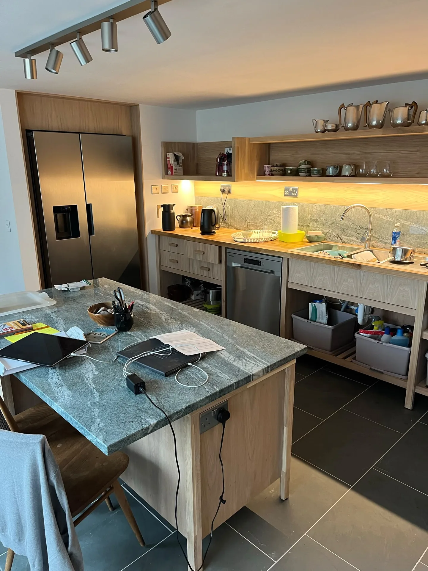 Modern kitchen with wooden cabinetry and island counter