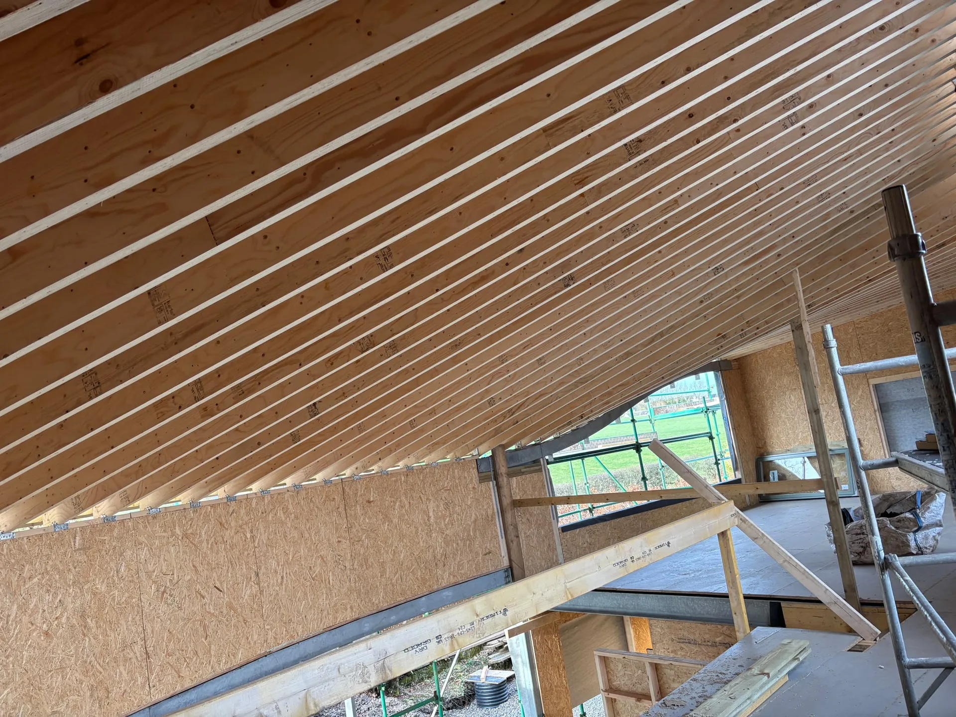 Modern interior ceiling with geometric wooden beams