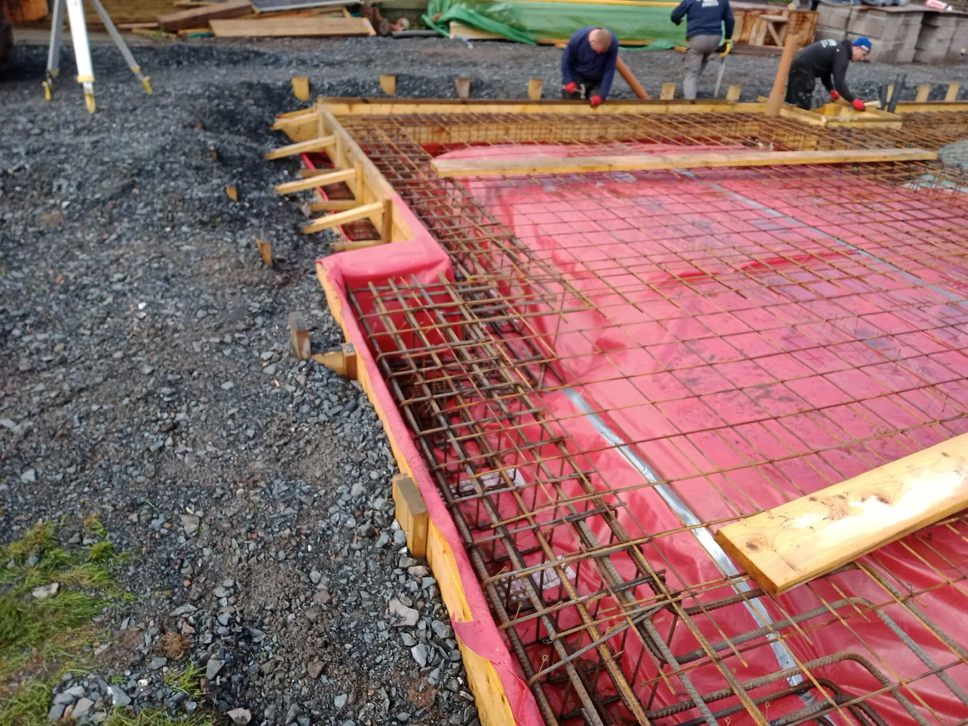 Concrete foundation with reinforcement mesh and formwork