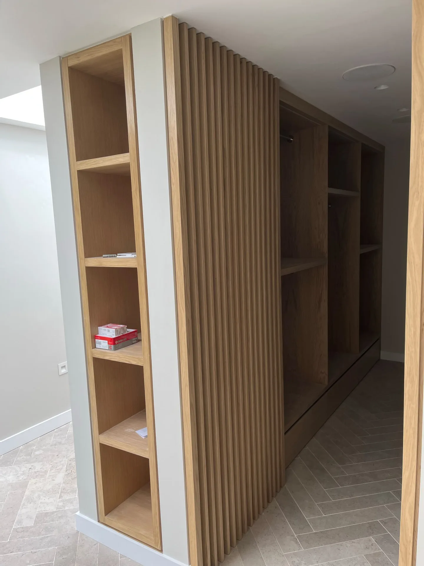 Modern wood closet with vertical paneling