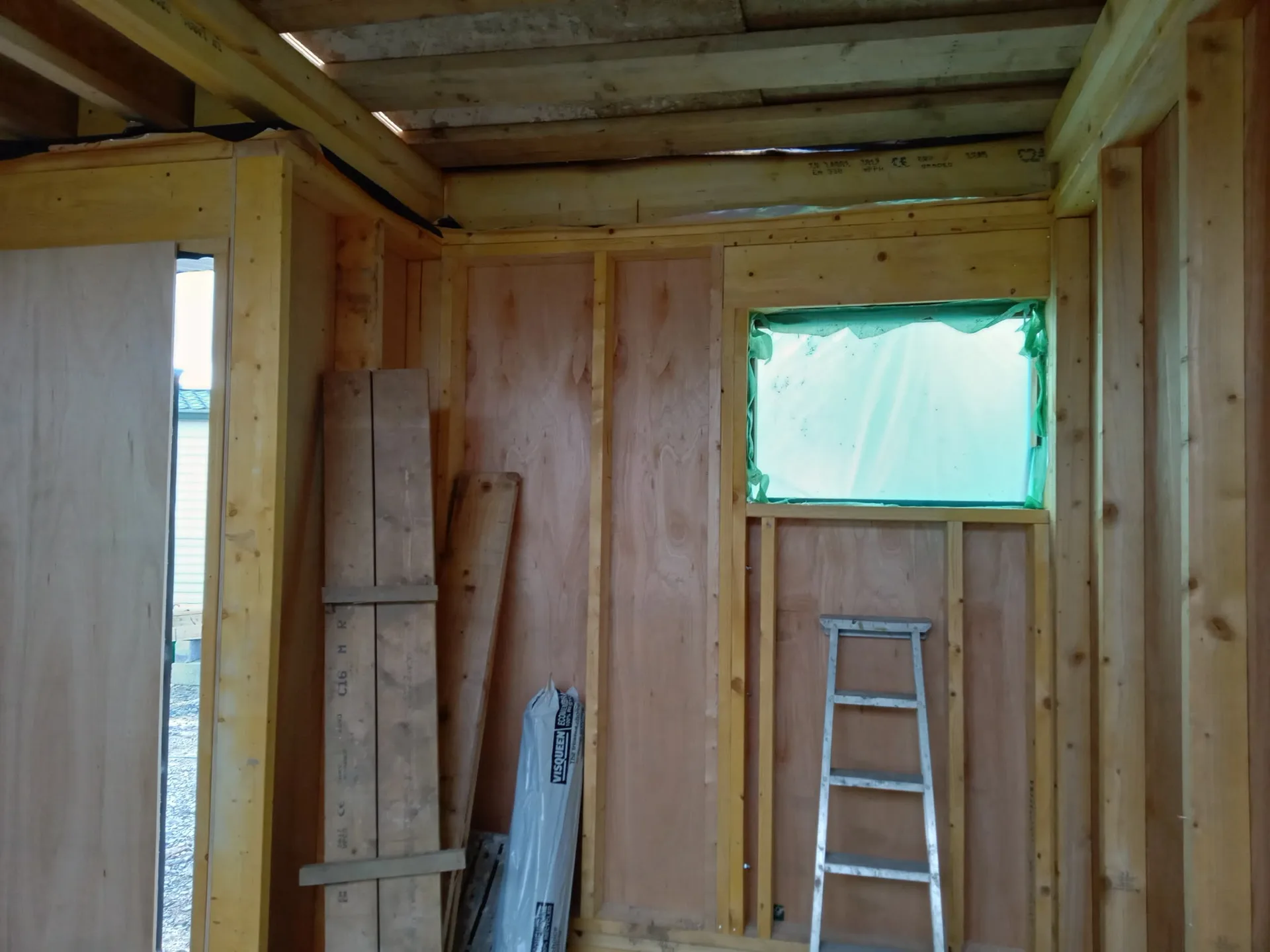 Interior framing and drywall installation in progress