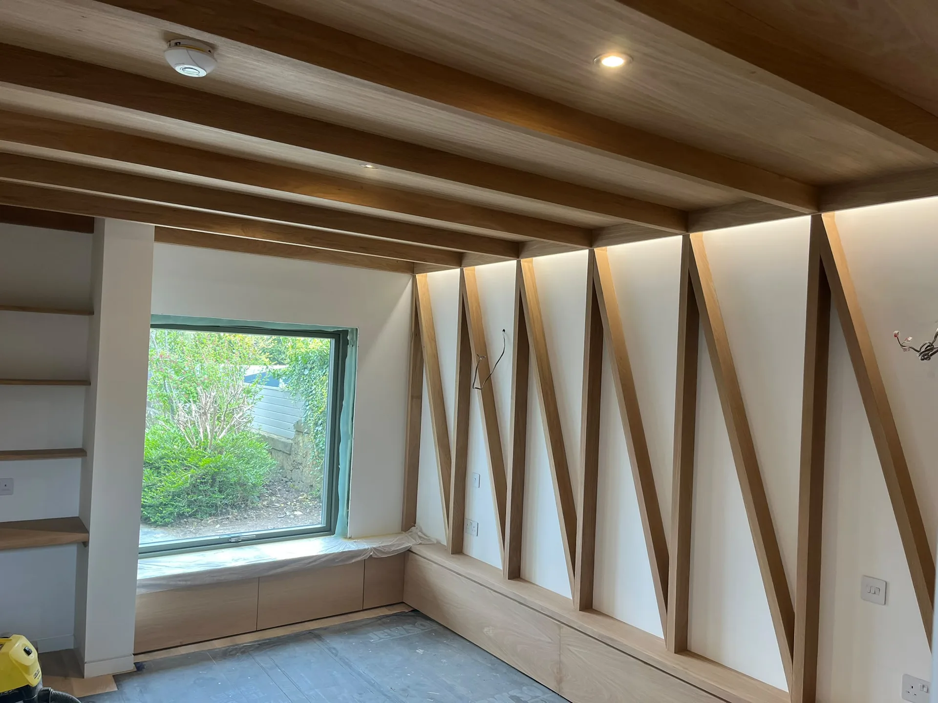 Modern interior with diagonal wooden architectural elements