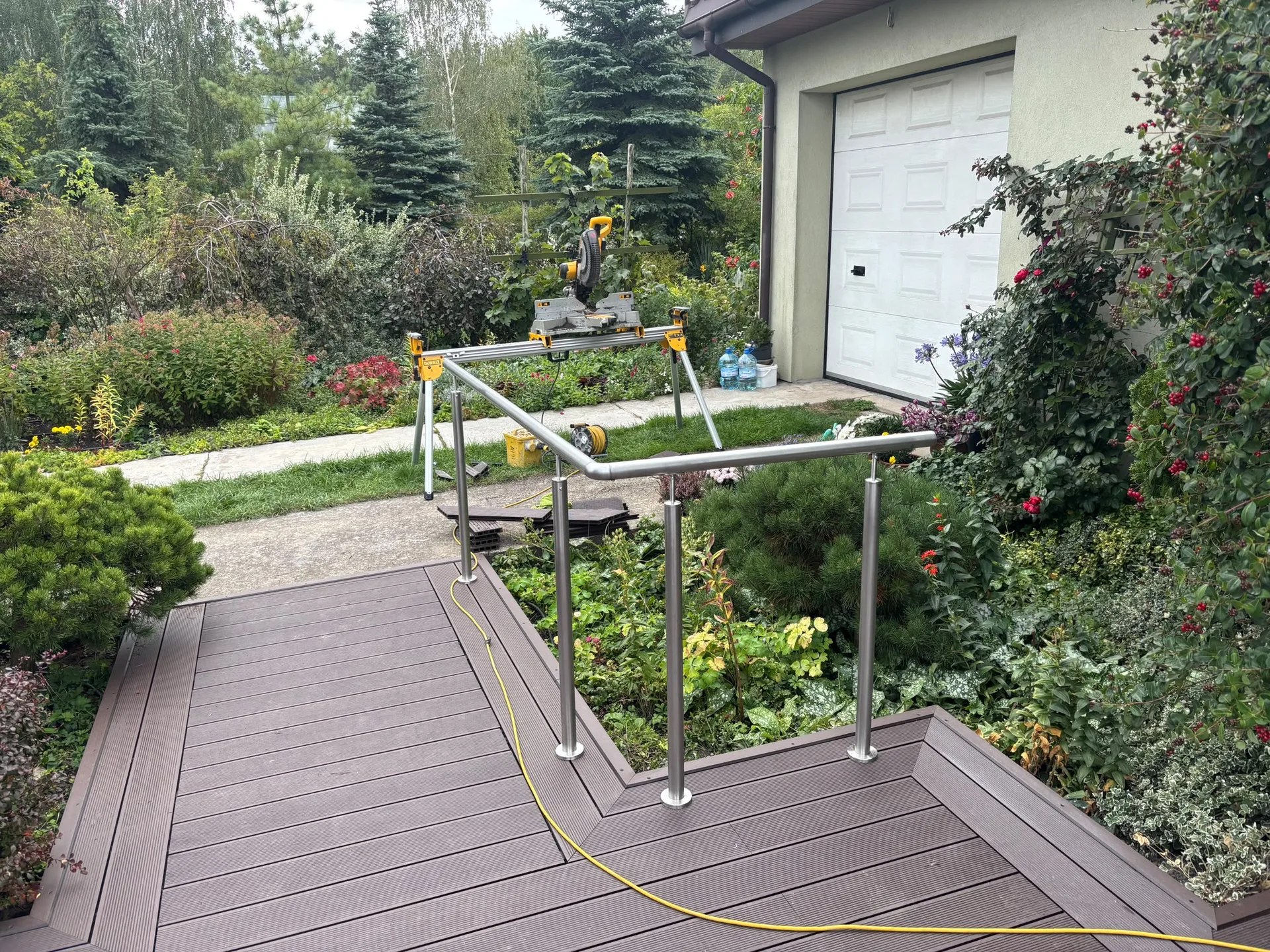 Modern wooden deck with steel safety railings
