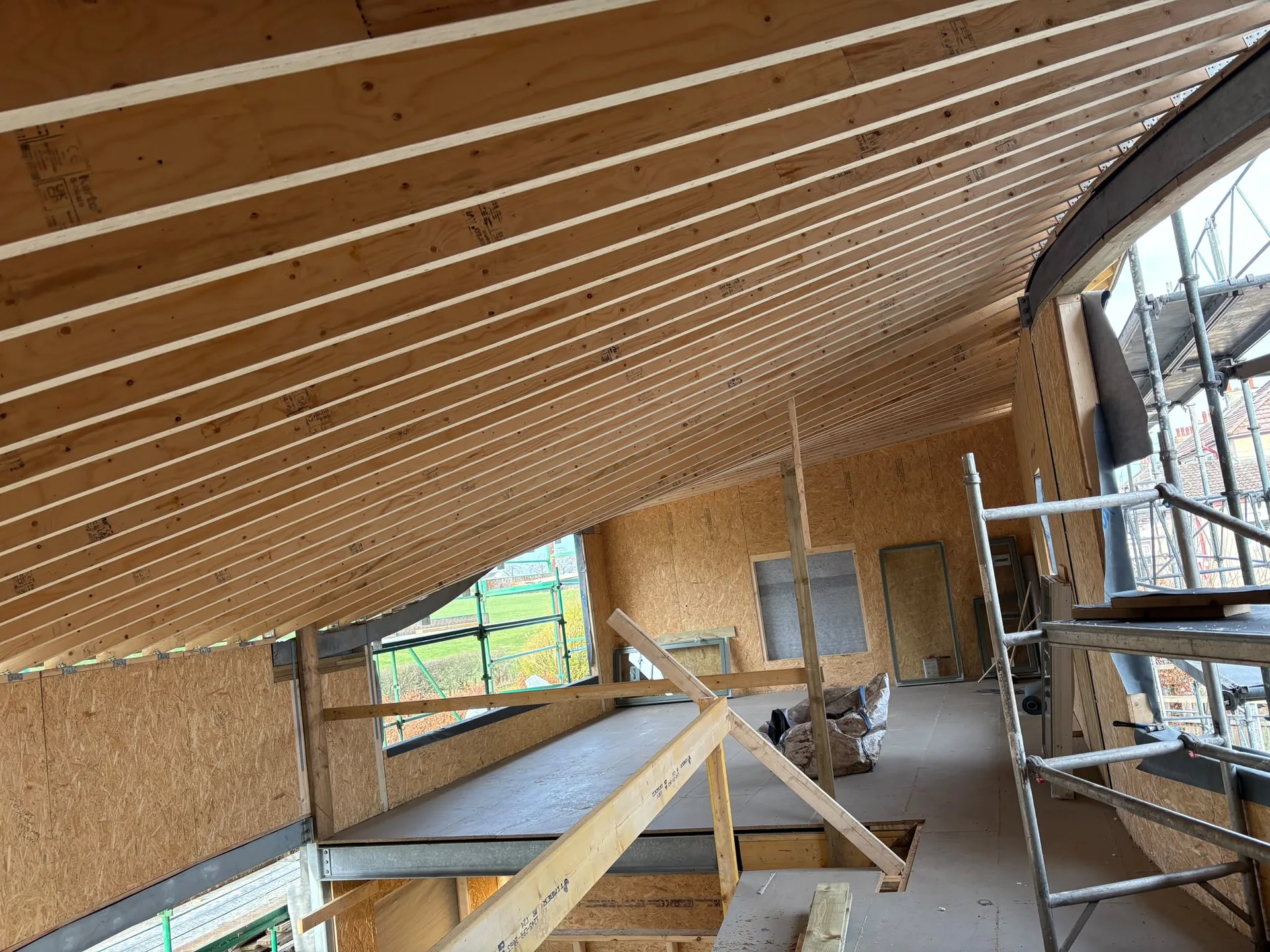 Modern interior under construction with wooden beams
