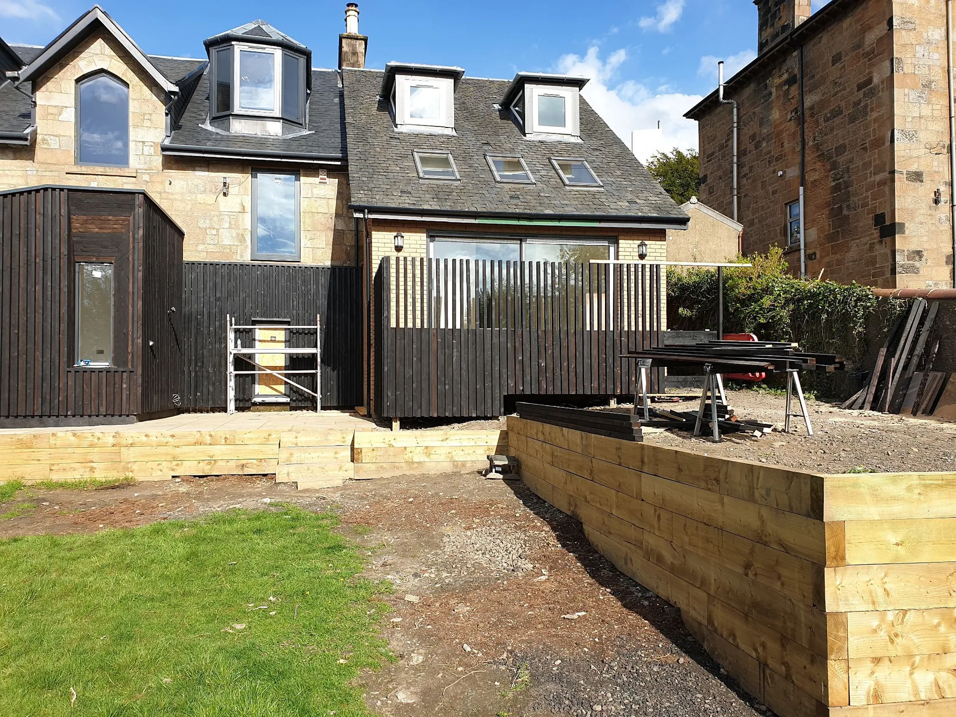 Modern extension with black timber cladding