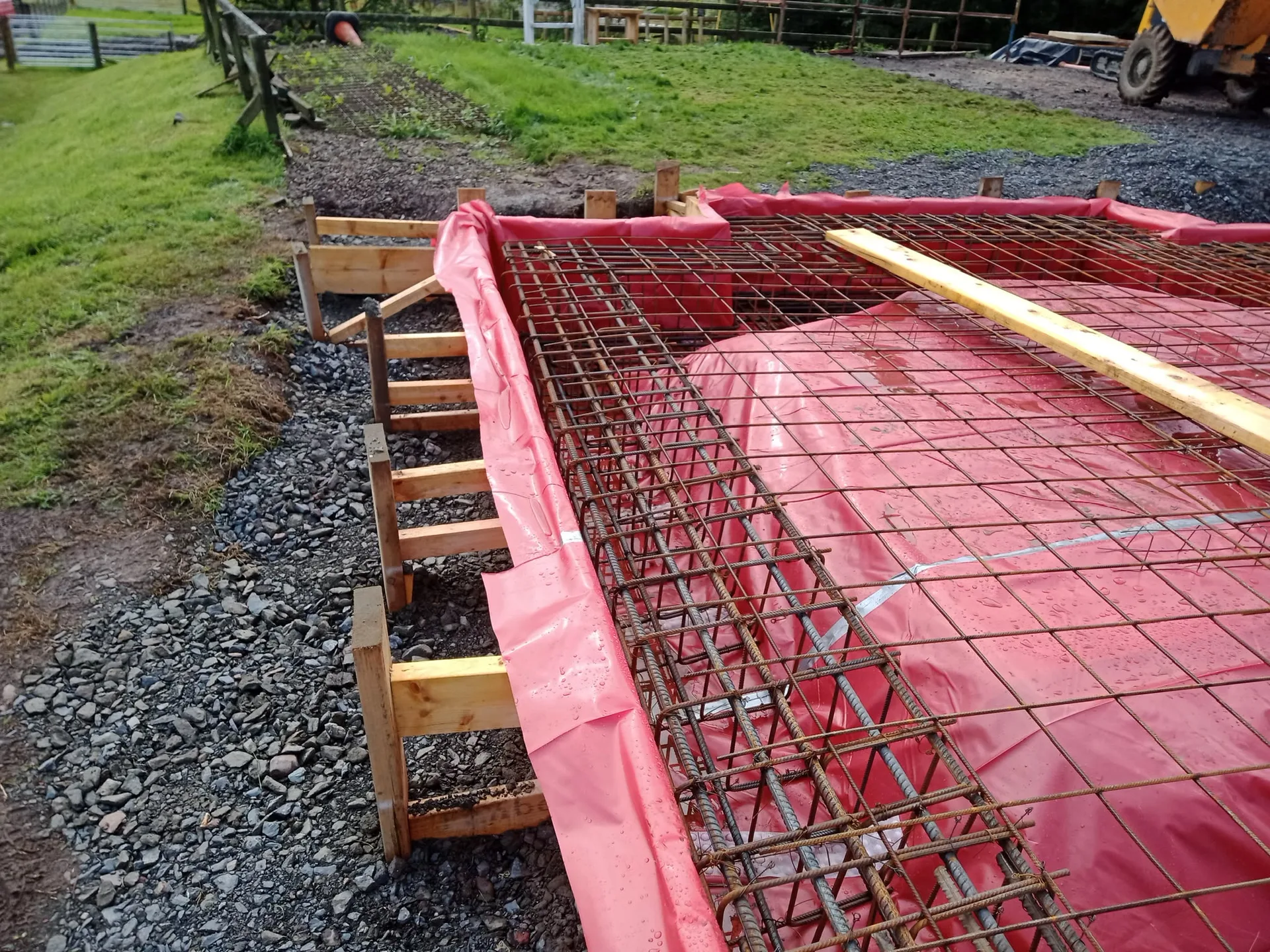 Concrete foundation reinforcement mesh and formwork setup